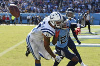 Indianapolis Colts wide receiver Michael Pittman Jr. (11) can't hold onto a pass as he is defended by Tennessee Titans cornerback Jackrabbit Jenkins (20) in the second half of an NFL football game Sunday, Sept. 26, 2021, in Nashville, Tenn. (AP Photo/Mark Zaleski)