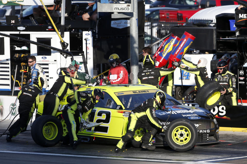 NASCAR Cup Series driver Ryan Blaney (12) makes a pit stop during a NASCAR Cup Series auto race at Las Vegas Motor Speedway, Sunday, Sept. 26, 2021, in Las Vegas. (AP Photo/Steve Marcus)