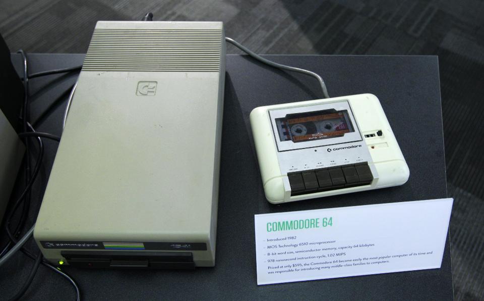 In this photo taken Oct. 30, 2012, a floppy disk drive, left, and a cassette tape data drive for a Commodore 64 personal computer are shown, at the Living Computer Museum in Seattle. For tourists with an interest in Seattle's role as a high-tech hub, there hasn't been much here to see, other than driving over to Microsoft headquarters in suburban Redmond to take pictures of a bunch of boring buildings. But Microsoft co-founder Paul Allen has just opened the Living Computer Museum, with displays of old machines _ all in working order _ along with a geeky wish list of items he'd like to add, just in case anybody out there has an old tape drive or super-computer sitting around. (AP Photo/Ted S. Warren)