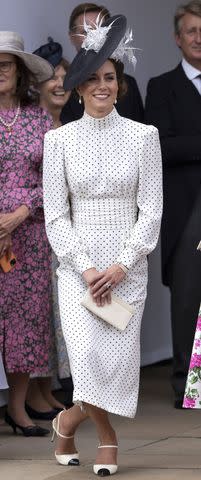 <p>Mark Cuthbert/UK Press via Getty Images</p> Kate Middleton curtsies to King Charles and Queen Camilla on June 19