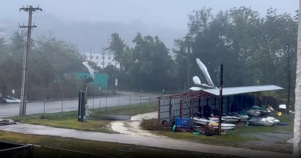 PHOTO: Winds tear roofing off a shed as Typhoon Mawar bears down on Guam, May 24, 2023. (Sean13213341/Twitter)