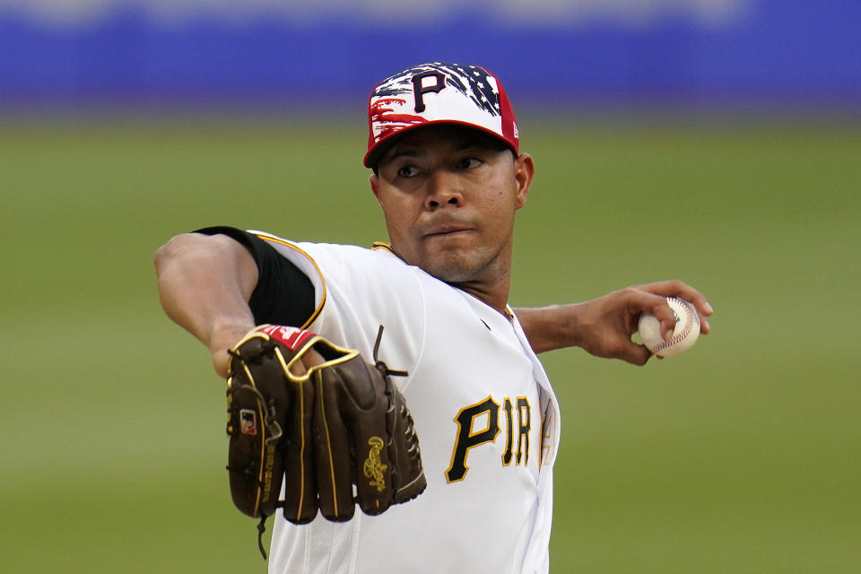 Pittsburgh Pirates starting pitcher Jose Quintana winds up during the first inning of the team's baseball game against the New York Yankees in Pittsburgh, Tuesday, July 5, 2022. (AP Photo/Gene J. Puskar)