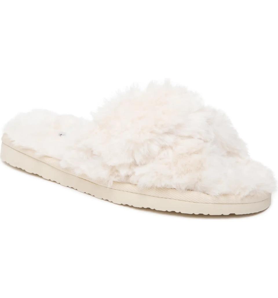 <p>With its soft, shearling composition and plush base, this <span>Minnetonka Teddy Faux Shearling Slipper</span> ($35, originally $50) manages to be both stylish and totally comfortable, too. Plus, we love that it also has a slip-resistant sole for added protection!</p>