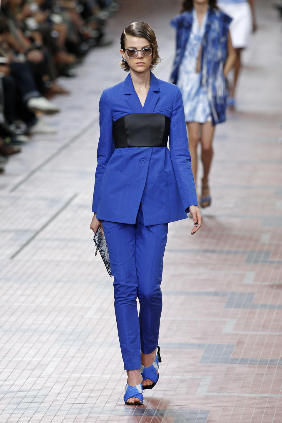 A model presents a creation as part of Kenzo's ready-to-wear Spring/Summer 2014 fashion collection, presented Sunday, Sept. 29, 2013 in Paris. (AP Photo/Thibault Camus)