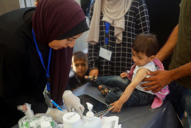 Malnourished Palestinian children receive treatment at the IMC field hospital in Deir Al-Balah, central Gaza Strip