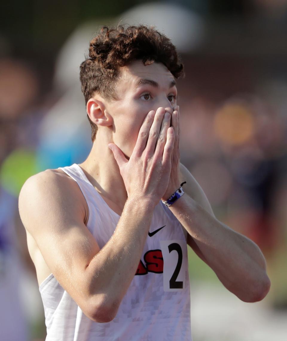 SPASH’s Bode Erickson reacts after winning the 1,600-meter run in Division 1 at the WIAA state track and field championships Saturday at Veterans Memorial Stadium in La Crosse.