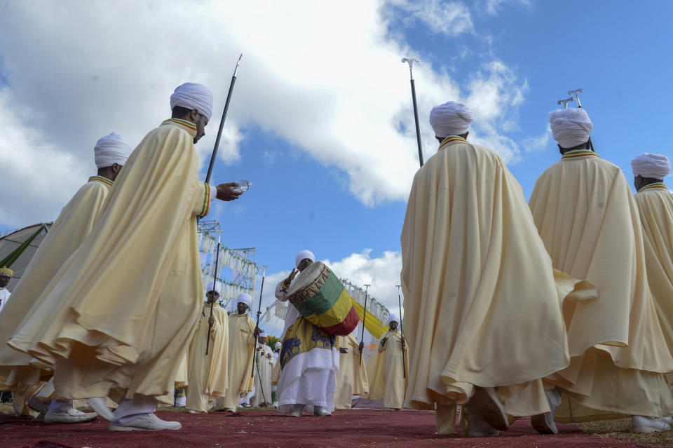 Ethiopian Orthodox Christians beat drums and sing religious songs to celebrate the second day of the festival of Timkat, or Epiphany, in the capital Addis Ababa, Ethiopia Wednesday, Jan. 19, 2022. The annual festival celebrates the baptism of Jesus Christ in the River Jordan. (AP Photo)