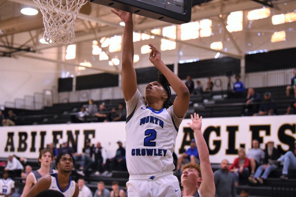 North Crowley's CJ Williams (2) lays the ball in during Saturday's Key City Classic championship game against Northwest Eaton.