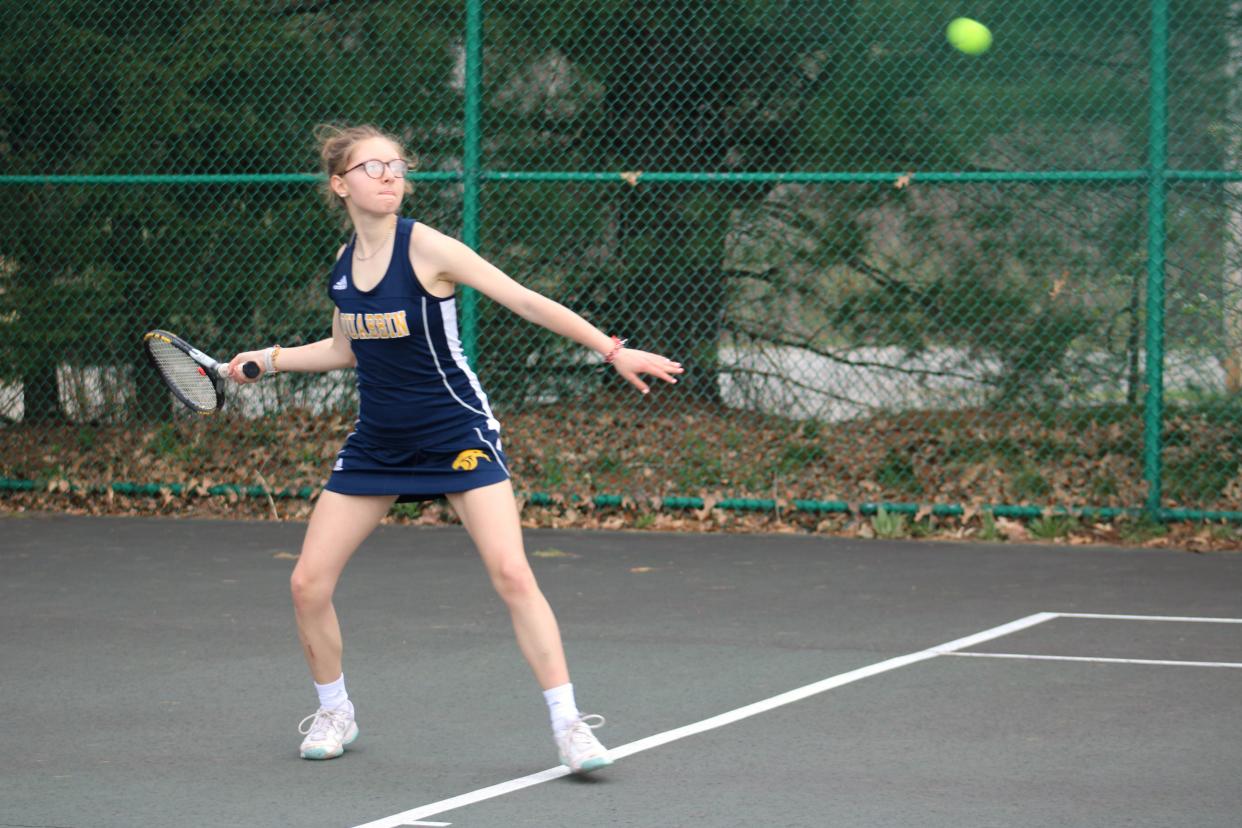 Quabbin's Annabelle Magill sets to hit the ball in the first singles match against Littleton on April 24, 2024.