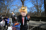 <p>A demonstrator dressed as Donald Trump poses for photos before the “Not My President’s Day” rally in Central Park West, New York City, on Feb. 20, 2017. (Gordon Donovan/Yahoo News) </p>