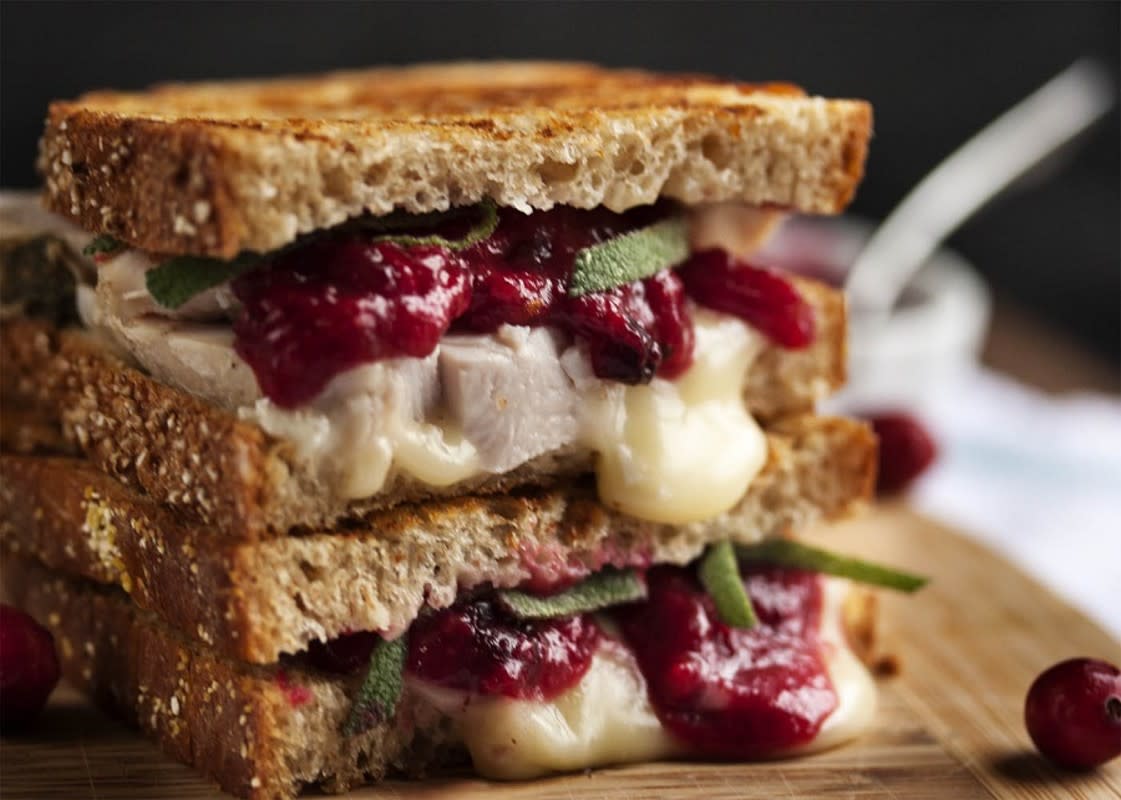 <p>Just a Little Bit of Bacon</p><p>Once Thanksgiving is over, the question is what to do with all the leftovers. This turkey, brie and cranberry panini provides a delicious answer.</p><p><strong>Get the recipe: </strong><a href="http://www.justalittlebitofbacon.com/turkey-brie-and-cranberry-mustard-panini/" rel="nofollow noopener" target="_blank" data-ylk="slk:Turkey, Brie and Cranberry Mustard Panini;elm:context_link;itc:0;sec:content-canvas" class="link rapid-noclick-resp"><strong>Turkey, Brie and Cranberry Mustard Panini</strong></a></p>