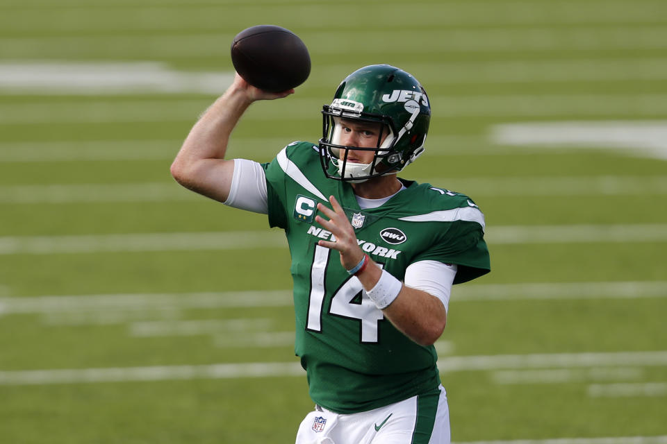 New York Jets quarterback Sam Darnold (14) throws a pass during the second half of an NFL football game against the Buffalo Bills in Orchard Park, N.Y., Sunday, Sept. 13, 2020. (AP Photo/Jeffrey T. Barnes)