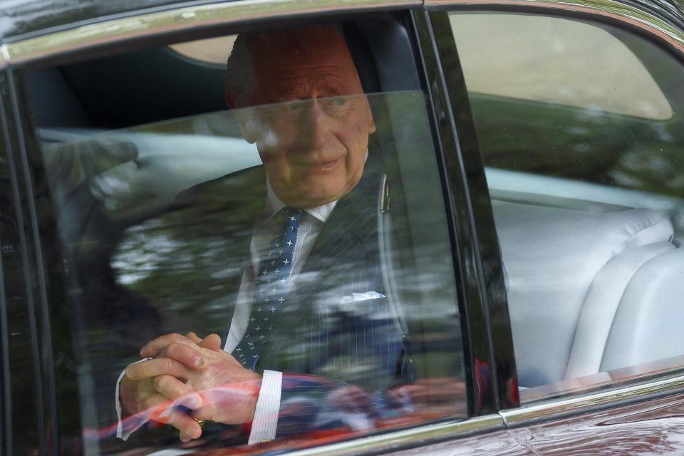 King Charles arrives into Buckingham Palace (PA)