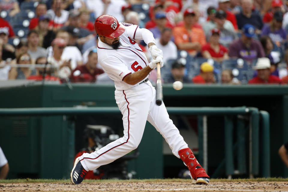 Washington Nationals' Anthony Rendon hits a three-run home run in the fifth inning of a baseball game against the Colorado Rockies, Thursday, July 25, 2019, in Washington. (AP Photo/Patrick Semansky)