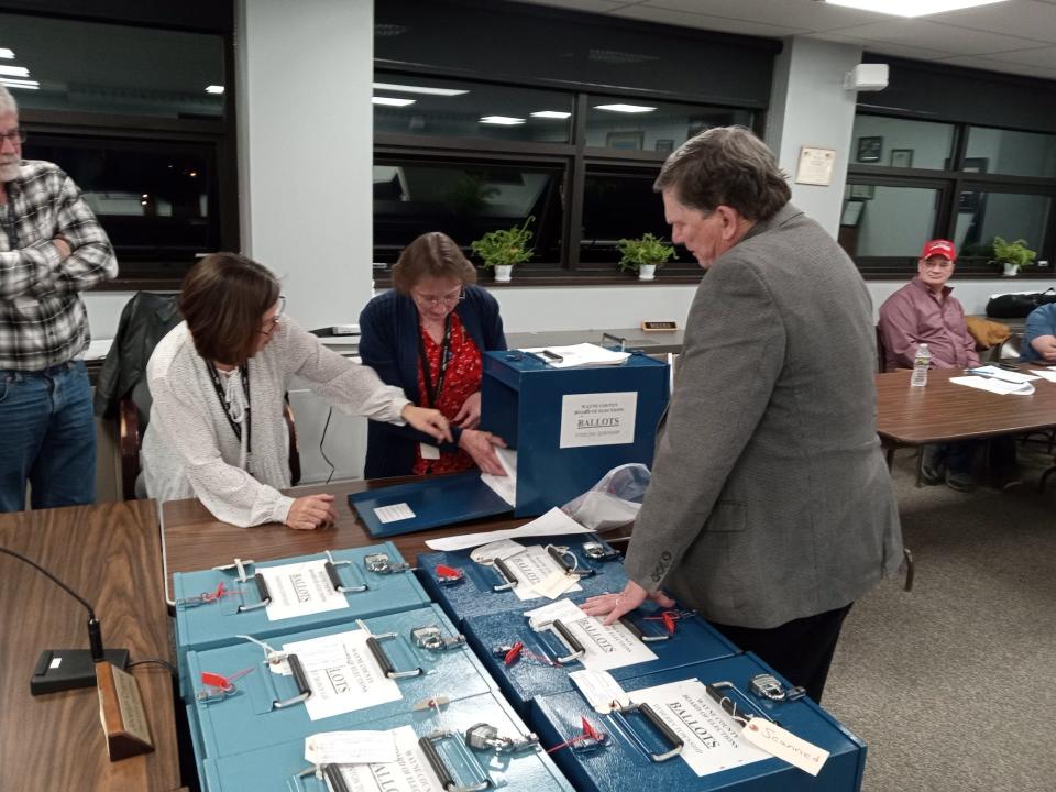 The Sterling Township precinct ballot box with the 24 disqualified ballots was opened last at the courthouse on Tuesday, April 23, 2024. From left around the box are Commissioner Jocelyn Cramer, chairperson of the Wayne County Board of Elections; retired Bureau of Elections Director Cindy Furman and County Clerk Andrew Seder.