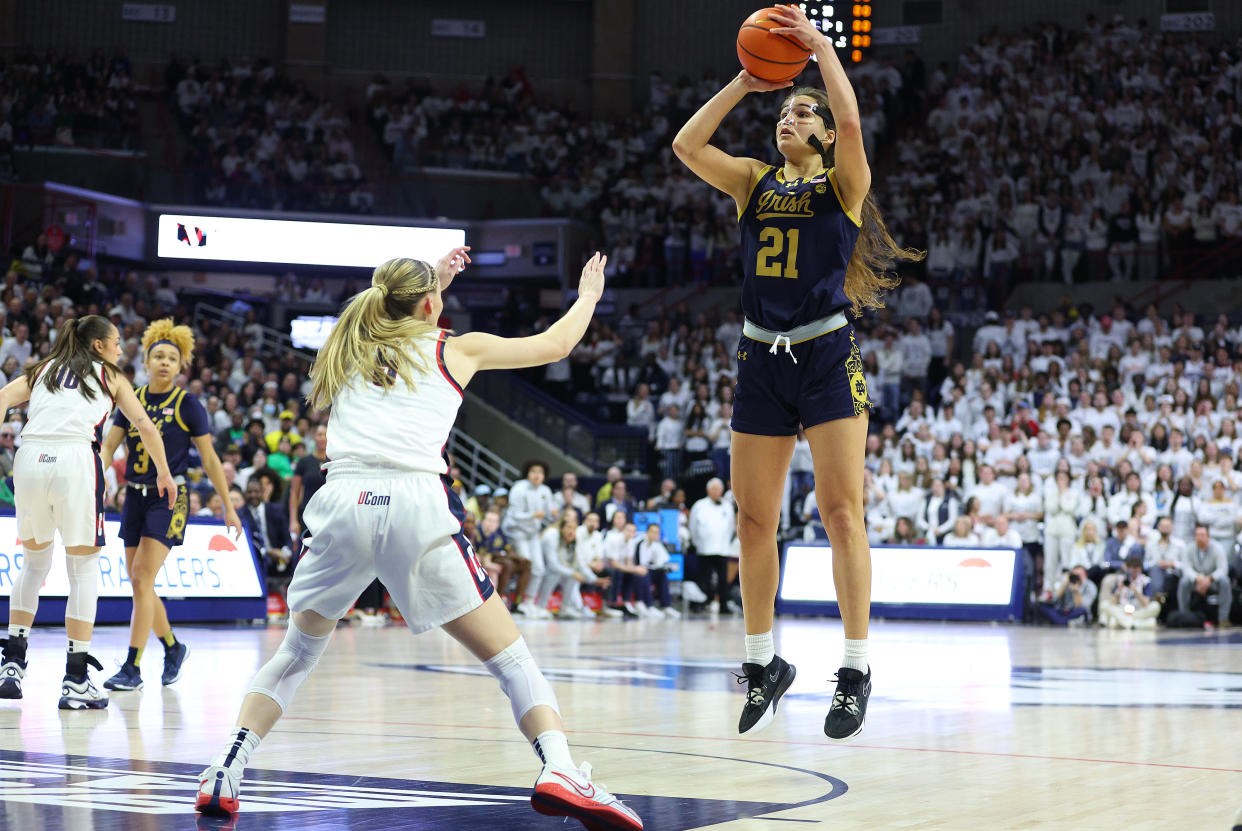 STORRS, CT - JANUARY 27: Notre Dame Fighting Irish forward Maddy Westbeld (21) defended by UConn Huskies guard Paige Bueckers (5) during the women's college basketball game between Notre Dame Fighting Irish and UConn Huskies on January 27, 2024, at Harry A. Gampel Pavilion in Storrs, CT. (Photo by M. Anthony Nesmith/Icon Sportswire via Getty Images)