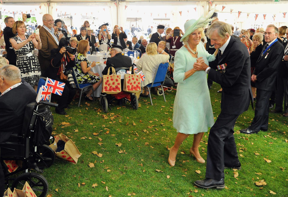 D-Day veteran Jim Booth, who was attacked at his home, dancing with the Duchess of Cornwall dancing (Eamonn M. McCormack/PA Wire)