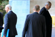 Syrian Ambassador to the U.N. Bashar al Jaafari (R) arrives at the United Nations office after being welcomed by United Nations mediator for Syria Staffan de Mistura (L) in Geneva, Switzerland, February 24, 2017. REUTERS/Pierre Albouy