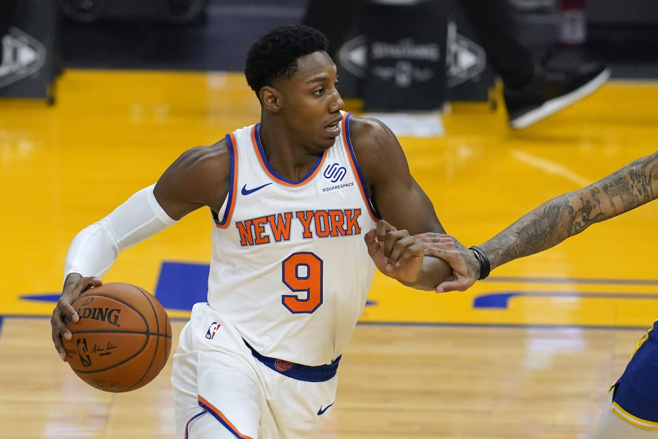 New York Knicks guard RJ Barrett works against the Golden State Warriors during the first half of an NBA basketball game in San Francisco, Thursday, Jan. 21, 2021. (AP Photo/Jeff Chiu)