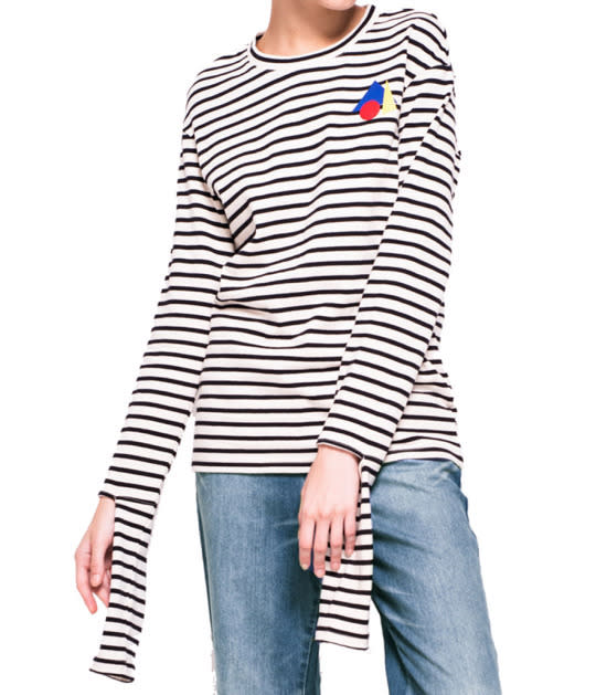 Add an elongated-sleeve knit inspired by Coperni Femme in your closet to play with your outfit proportions.