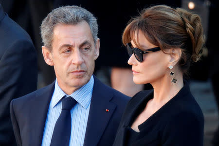 Former French President Nicolas Sarkozy and his wife Carla Bruni-Sarkozy REUTERS/Charles Platiau