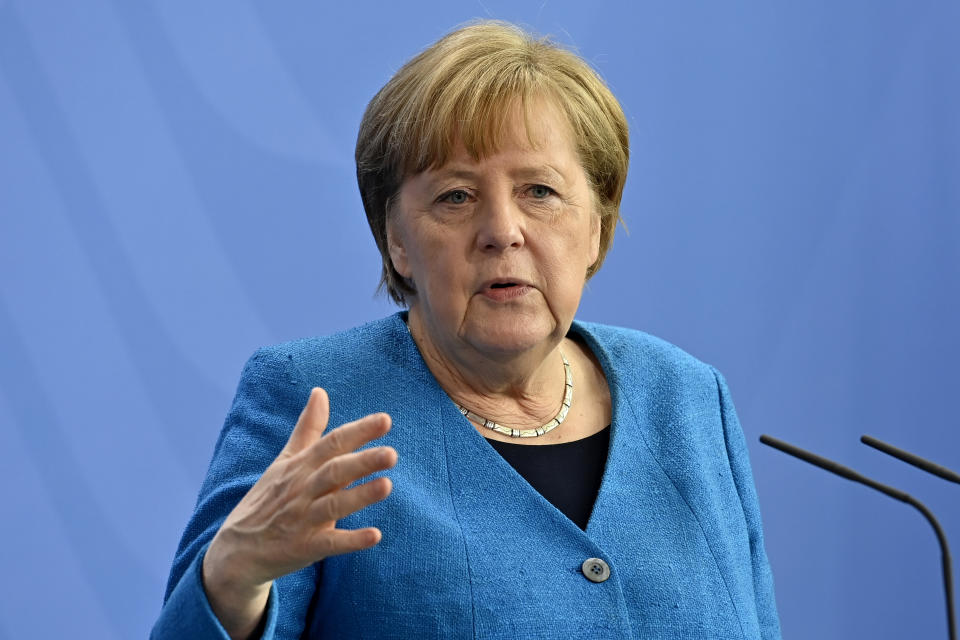 German Chancellor Angela Merkel attends a press conference after the informal EU summit and the EU-China summit in Berlin, Germany, Saturday, May 8, 2021. Merkel reiterated her stance that the shortage of vaccines worldwide would not be solved by a waiver of patents, as suggested by U.S. President Biden. (John MacDougall/Pool Photo via AP)