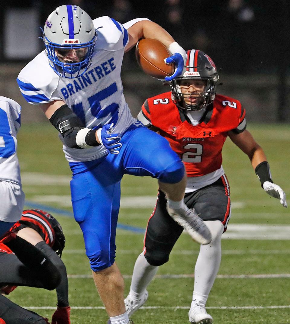 Braintree's James Curry, a junior, hurdles over some blockers for a first down on Friday, Sept. 15, 2023.