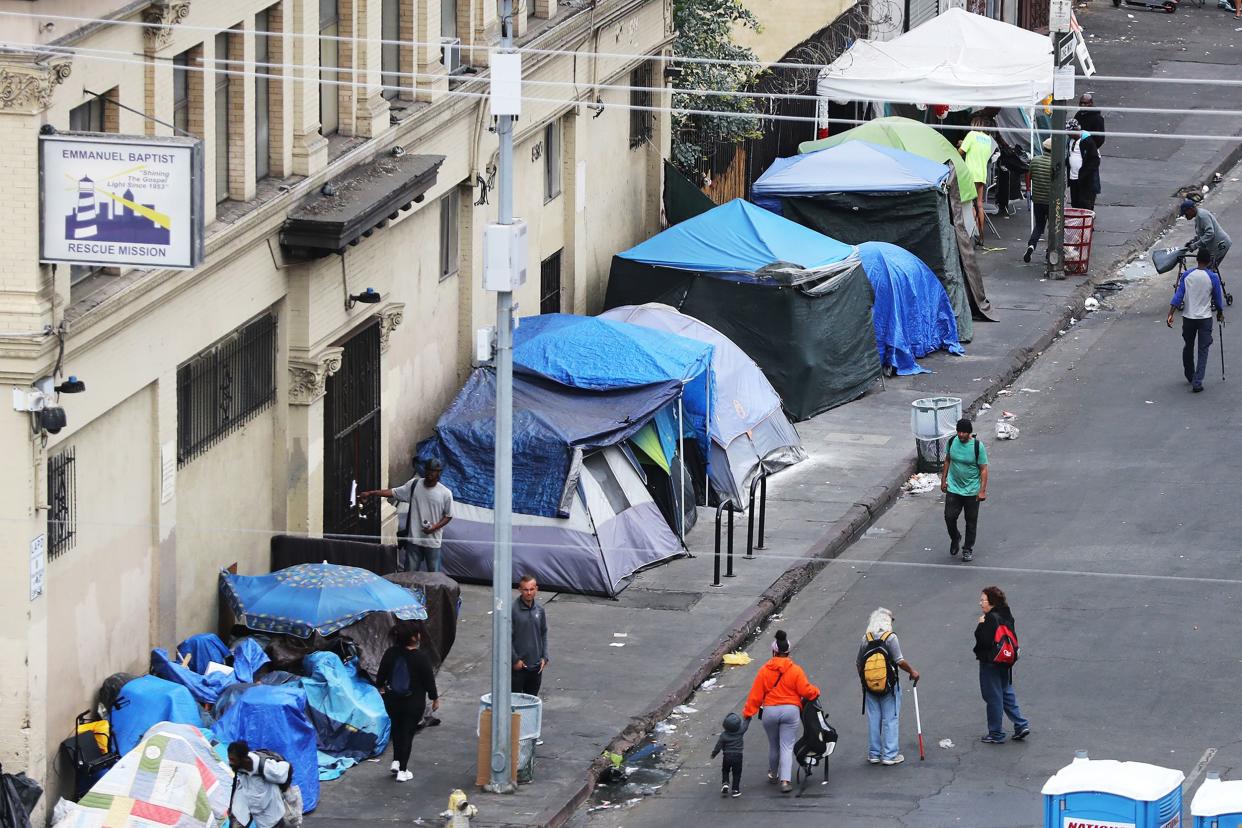 mission on la's skid row holds back-to-school giveaway for the underprivileged