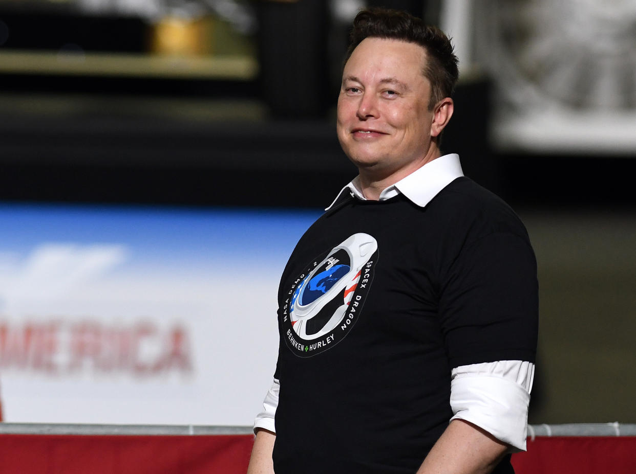  SpaceX founder Elon Musk looks on after being recognized by U.S. President Donald Trump at NASA's Vehicle Assembly Building after watching the successful launch of a Falcon 9 rocket with the Crew Dragon spacecraft from pad 39A at the Kennedy Space Center. NASA astronauts Doug Hurley and Bob Behnken will rendezvous and dock with the International Space Station, becoming the first people to launch into space from American soil since the end of the Space Shuttle program in 2011. (Photo by Paul Hennessy / SOPA Images/Sipa USA) 