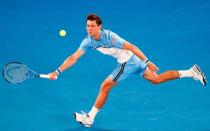 Rafael Nadal showed flashes of his best form as he eased past home favourite Matthew Ebden to reach the Australian Open third round. 