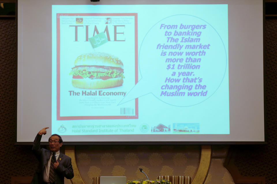 A lecturer speaks during a seminar for employees at the Al Meroz hotel in Bangkok