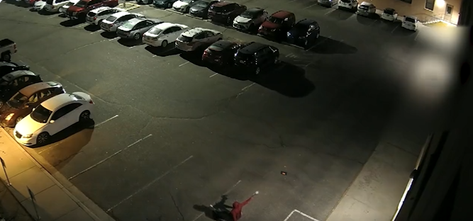 Surveillance video from NMSU police shows last month's deadly shootout between suspended NMSU basketball player Mike Peake and UNM student Brandon Travis.