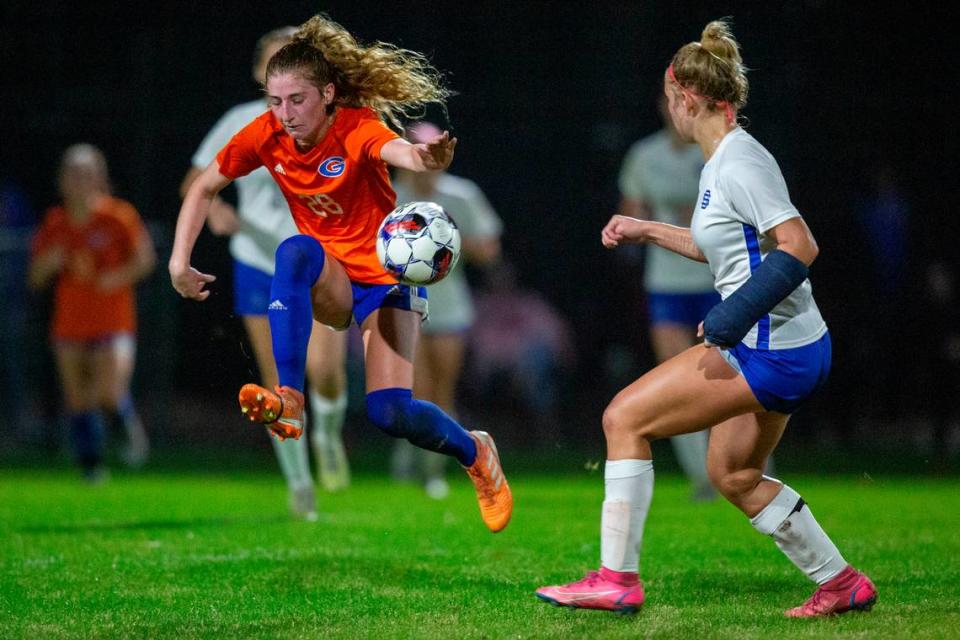 Gulfport’s Mary Frances Symmes blocks a shot with her body during the 6A South State Championship game in Gulfport on Tuesday, Jan. 31, 2023.