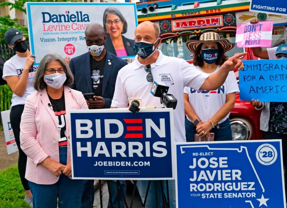 Democratic state Sen. Jose Javier Rodriguez campaigns and shows his support of Miami-Dade mayoral candidate Daniella Levine Cava on the first day of early voting for the general election at Shenandoah Branch Library, 2111 SW 19th St., on Monday, Oct. 19, 2020, in Miami, Florida.