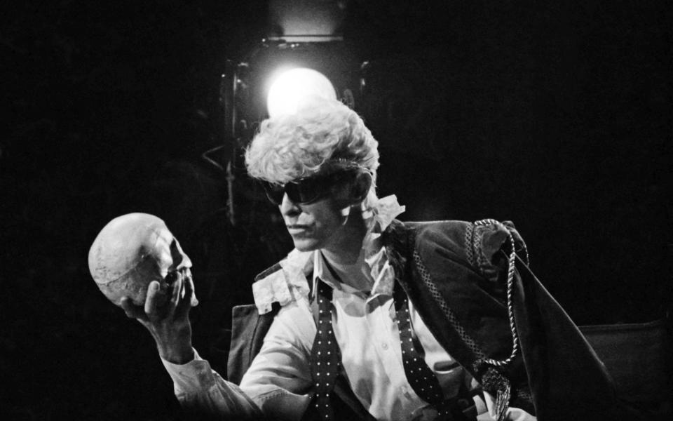 Bowie pictured performing to a skull - Janet Macoska 