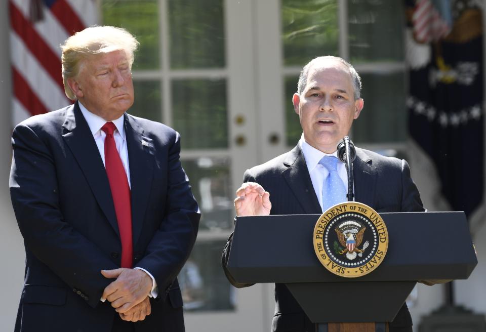 President Donald Trump looks on as Environmental Protection Agency Administrator Scott Pruitt speaks after announcing the U.S. withdrawal from the Paris climate agreement on June 1, 2017. (Photo: SAUL LOEB via Getty Images)