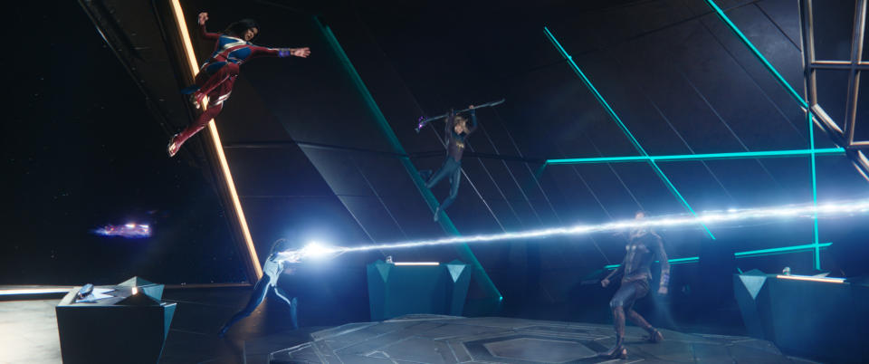 (L-R): Iman Vellani as Ms. Marvel/Kamala Khan, Teyonah Parris as Captain Monica Rambeau, Brie Larson as Captain Marvel/Carol Danvers, and Zawe Ashton as Dar-Benn in Marvel Studios' THE MARVELS. Photo courtesy of Marvel Studios. © 2023 MARVEL.