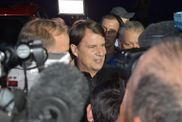 Ford CEO Jim Farley is swarmed by members of the media after the 2024 F-150 reveal at Hart Plaza in Detroit on the eve of the North American International Auto Show on Tuesday, Sept. 12, 2023.