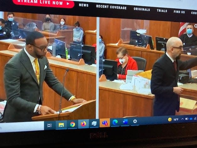 Defense attorney B'Ivory LaMarr, left, and prosecutor Grant Huebner, right, making opening statements Wednesday in the homicide trial of Theodore Edgecomb in Milwaukee