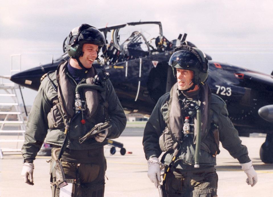 Sharkey Ward, right, with his son Kristian, a fellow pilot