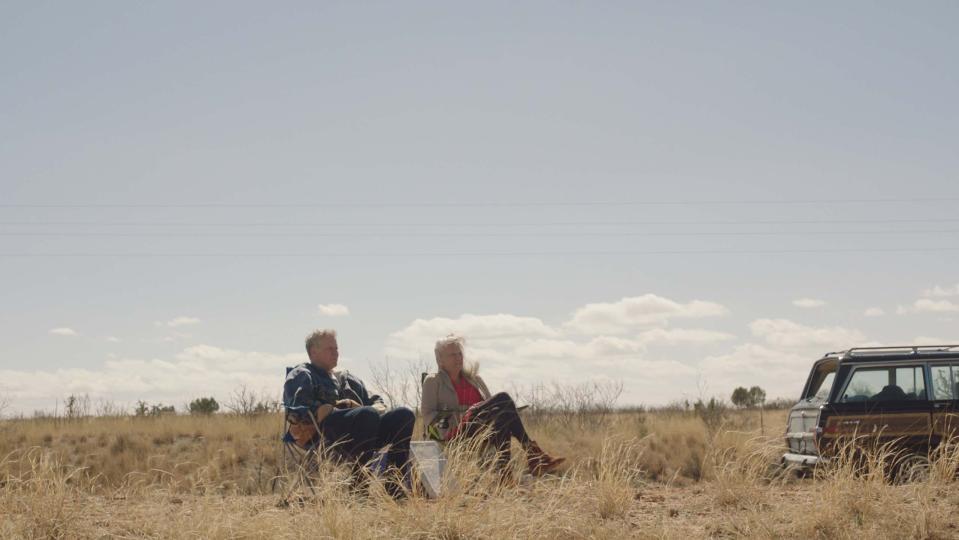 Will Ferrell, left, and Harper Steele tailgate throughout the United States with fold-up chairs and Natural Light Beer.