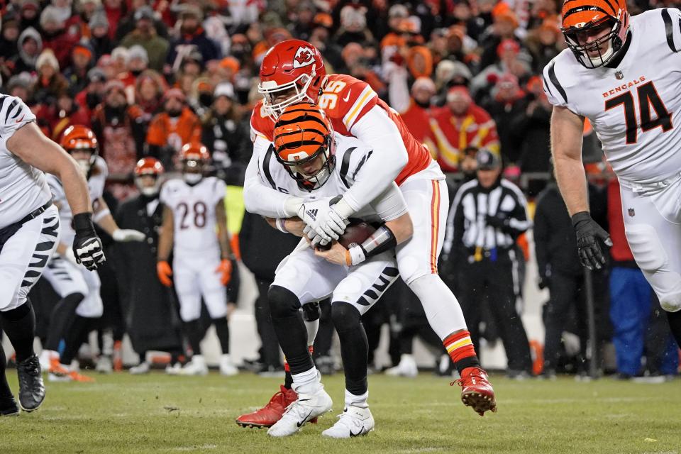 Chiefs defensive tackle Chris Jones sacks Bengals quarterback Joe Burrow in the first quarter.