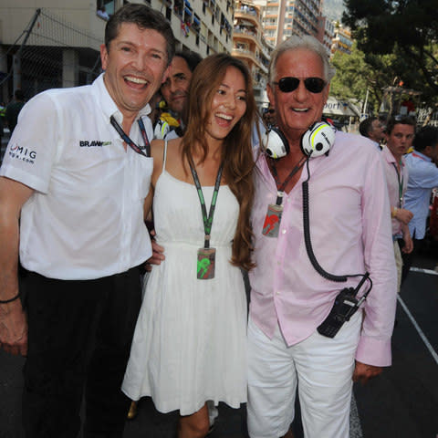 Nick Fry, Jessica Michibata and John Button at the Monaco Grand Prix in 2009 - Credit:  Getty Images