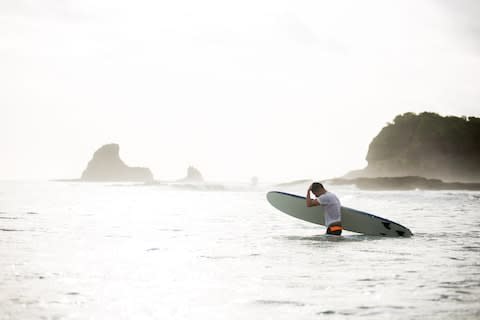 A surfer in Nicaragua - Credit: GETTY