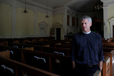 The Reverend William Peyton poses for a portrait at St. Paul's Memorial Church, ahead the one-year anniversary of the fatal white-nationalist rally, in Charlottesville, Virginia, U.S., August 1, 2018. REUTERS/Brian Snyder