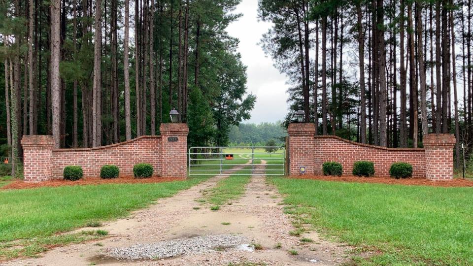 The gates near Alex Murdaugh's home in Islandton, SC, are seen on 20 September 2021 (AP)