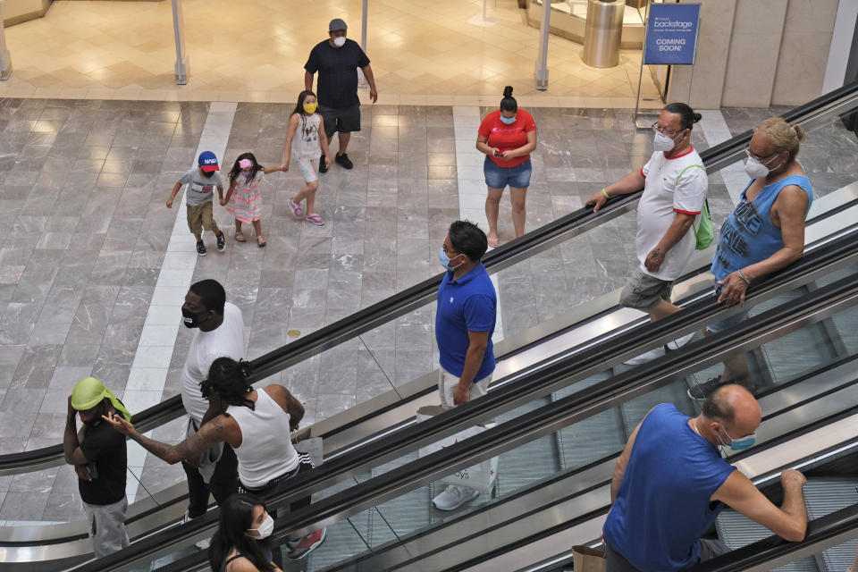 Shoppers walk around Garden State Plaza mall in Paramus, N.J., June 29, 2020. (Seth Wenig / AP file)