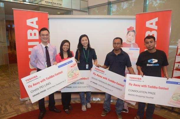 Lucky winners of the “Fly Away with Toshiba” contest.