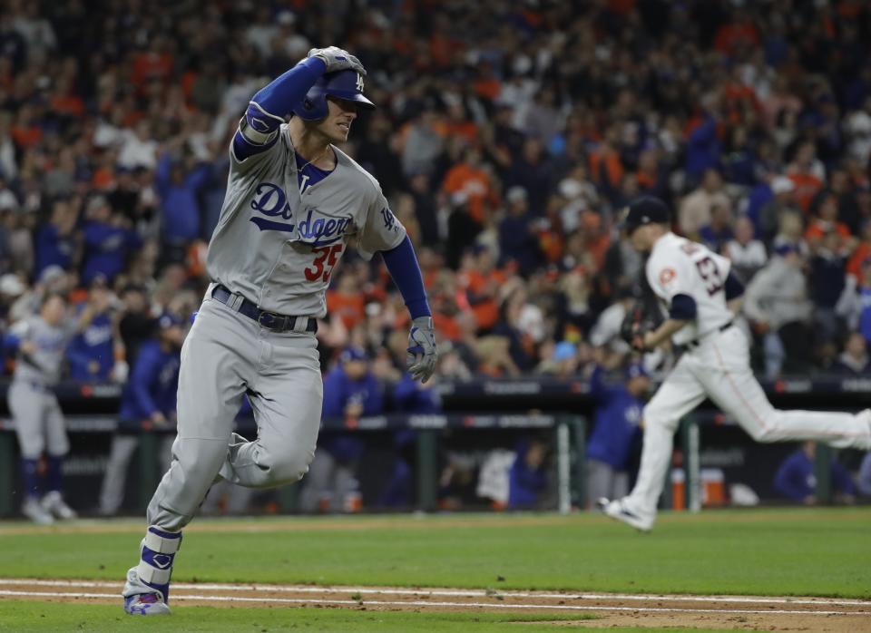 Los Angeles Dodgers’ Cody Bellinger reacts after hitting an RBI double during the ninth inning of Game 4 of the World Series. (AP)