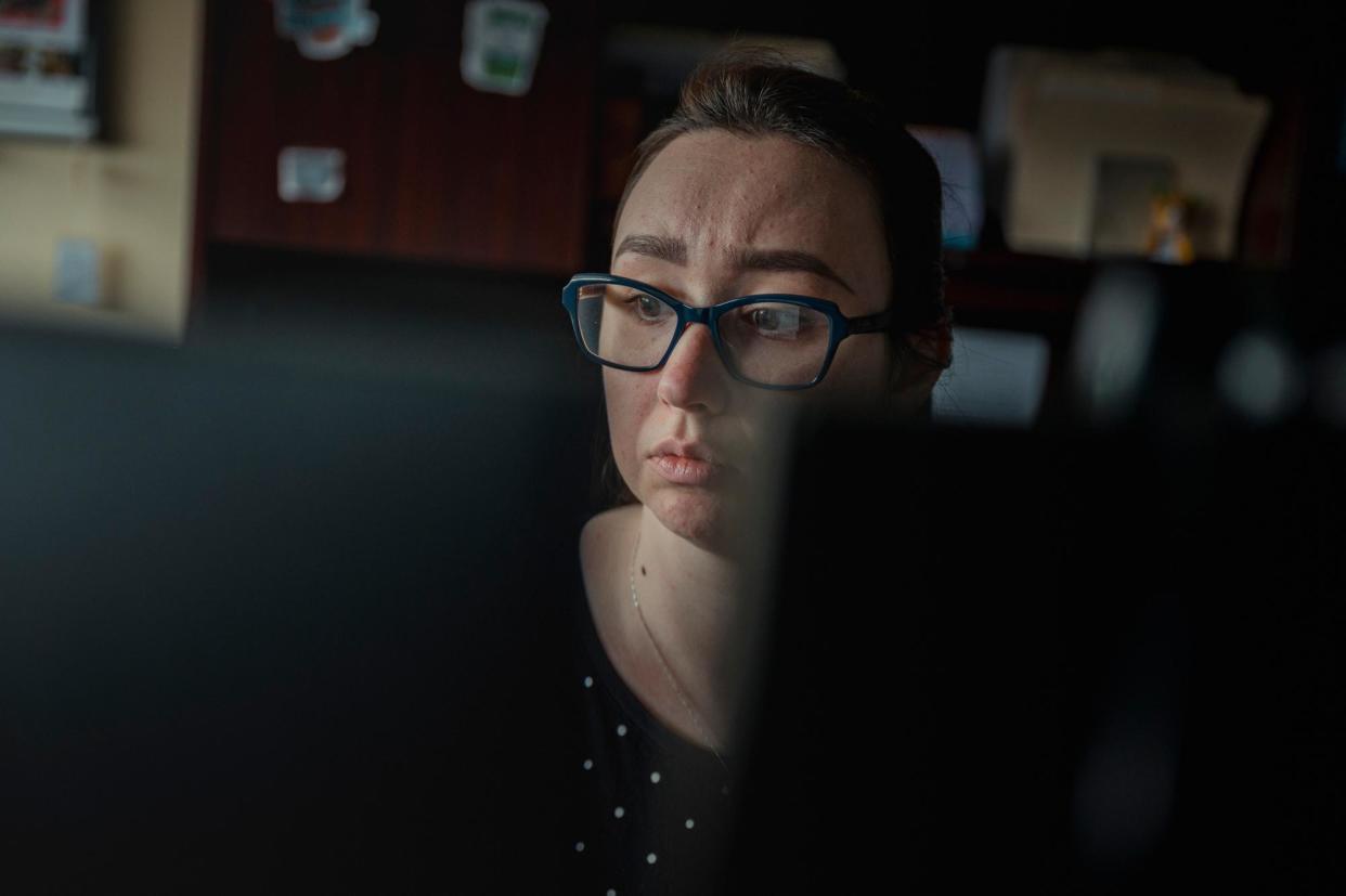 <span>Emily Cook, 26, acting director of elections, prepares to print ballots in her office in the Luzerne county elections office in Wilkes-Barre, Pennsylvania, on Tuesday.</span><span>Photograph: Hannah Yoon/The Guardian</span>